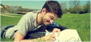 Man Writing in Journal